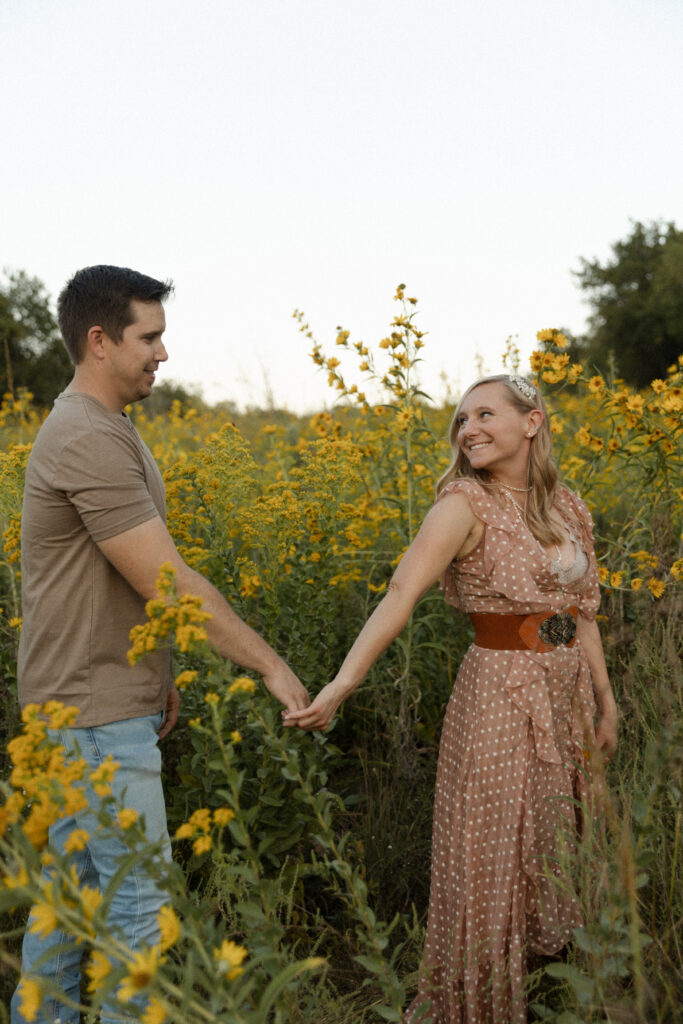 Engagement session in wildflowers at Shawnee Mission Park in Kansas City.