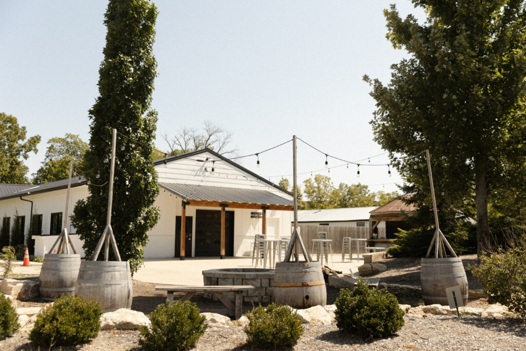 barn wedding venue with patio lights at cedar valley forest in kansas
